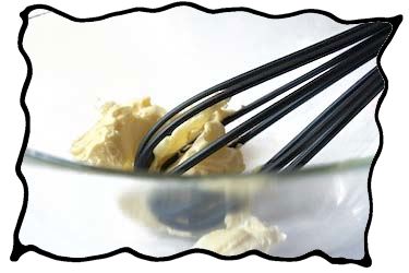 Whisking the softened butter